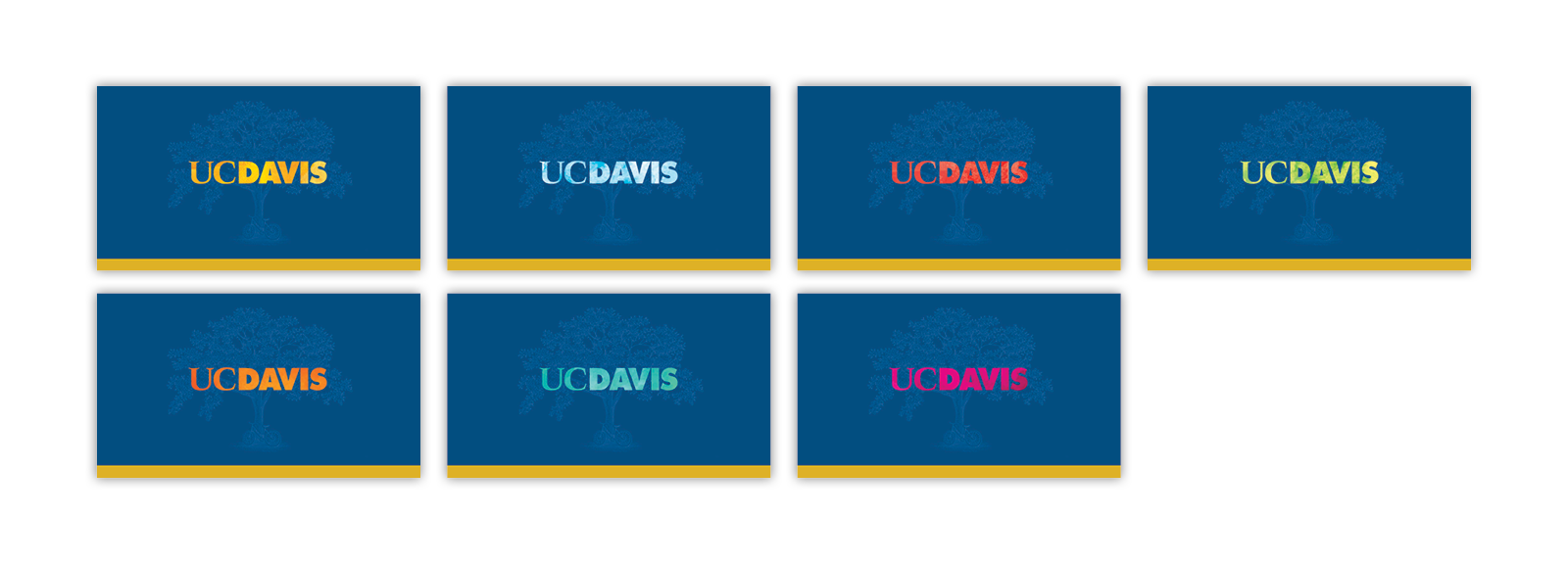 a set of seven business card backs are shown. all have a blue field and a UC Davis wordmark. Each wordmark is a different color.
