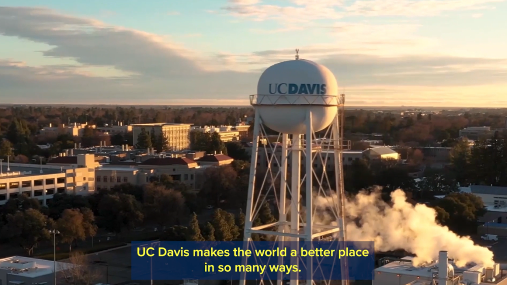 an aerial view of the UC Davis water tower at sunrise